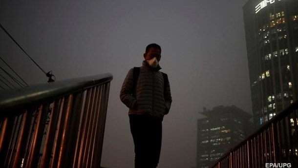 В Пекине объявили оранжевый уровень опасности из-за тумана